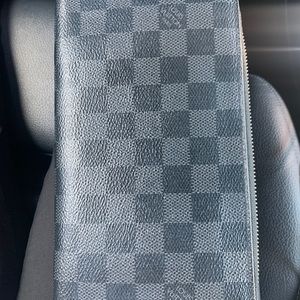 Great condition authentic Louis Vuitton wallet much space even for two passport